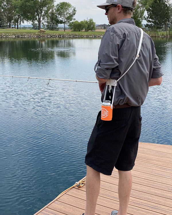 Fishing and standing upright side view - orange Sip-Line