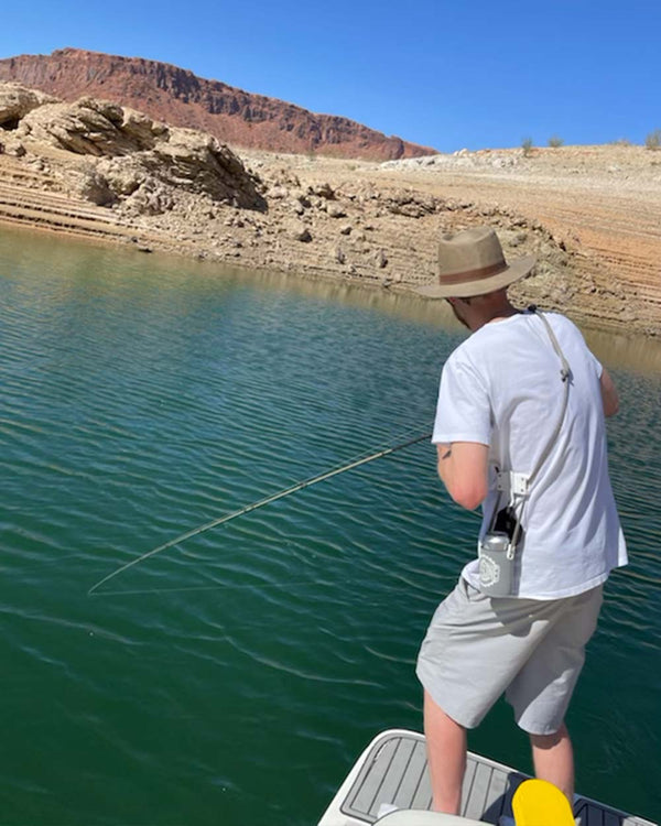 Man Fishing with Grey Sip-Line side view